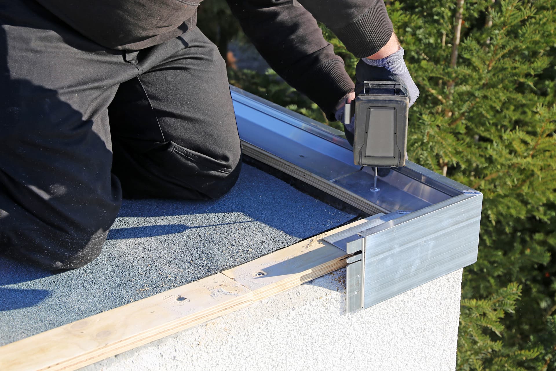 a flat roof being installed